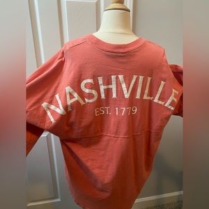 Oversized dark peach or coral Nashville graphic long sleeve t-shirt